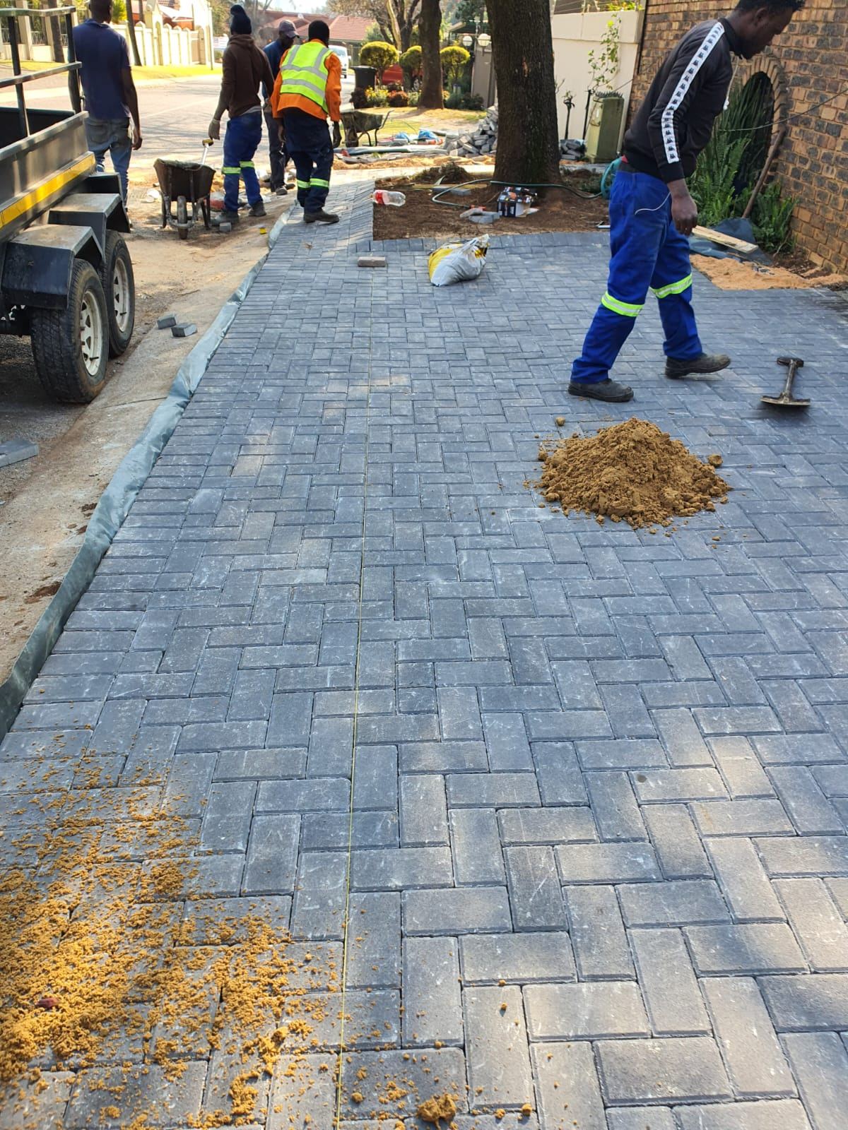 Compaction equipment on a paved surface