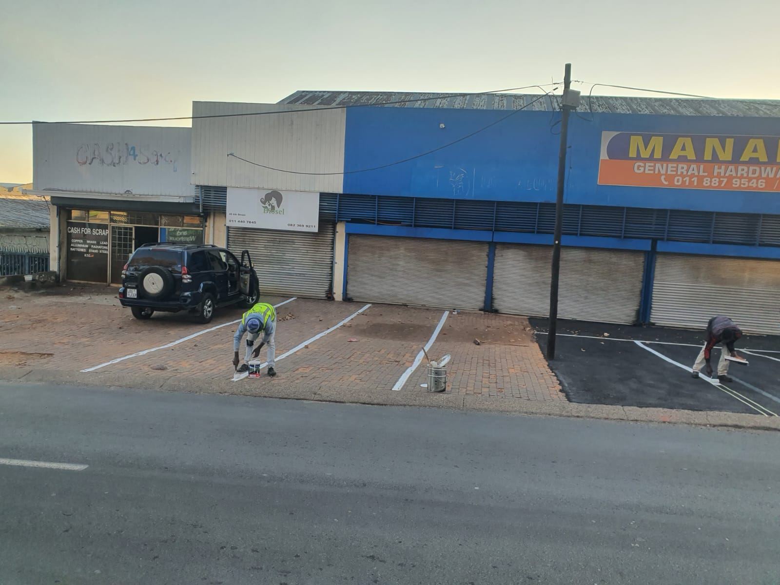 Block paved entrance with landscaping